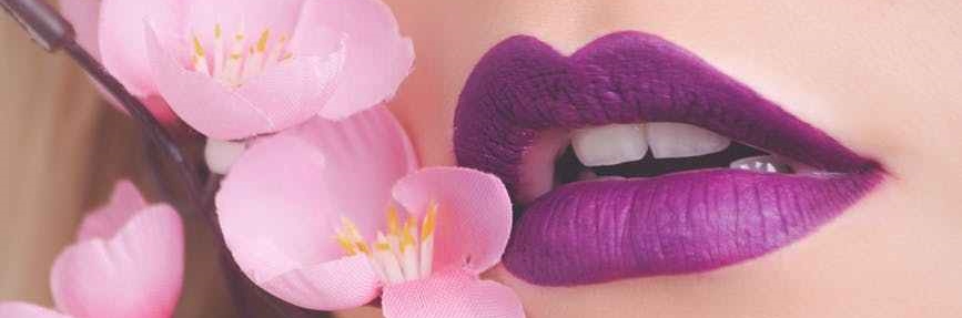 woman showing her purple lipstick